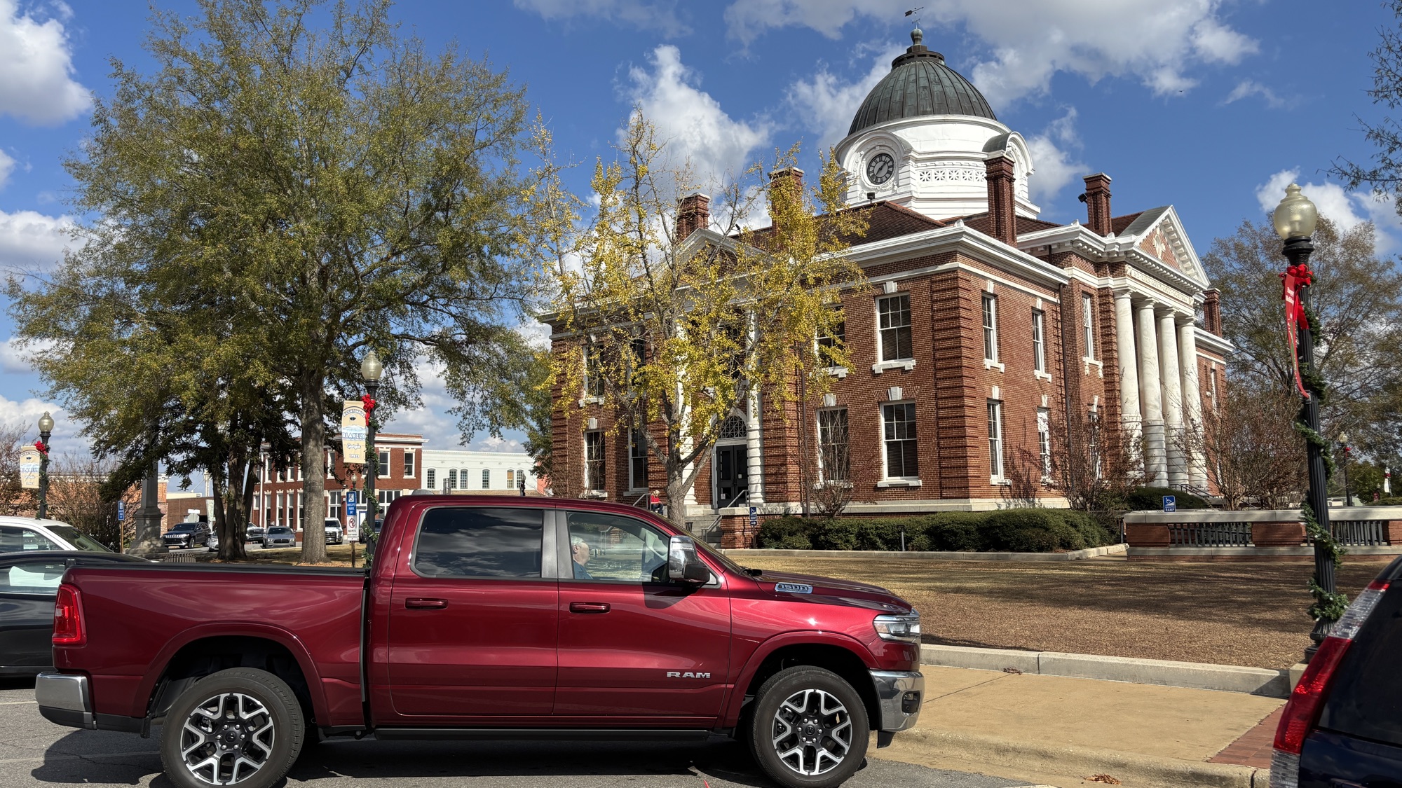 The Ram parked at a small-town courthouse.
